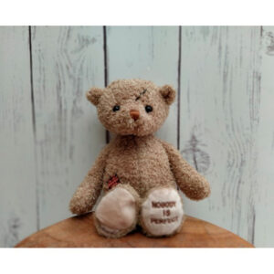 Peluche Nobody is Perfect