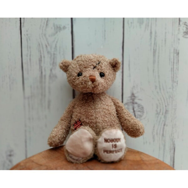 Peluche Nobody is Perfect
